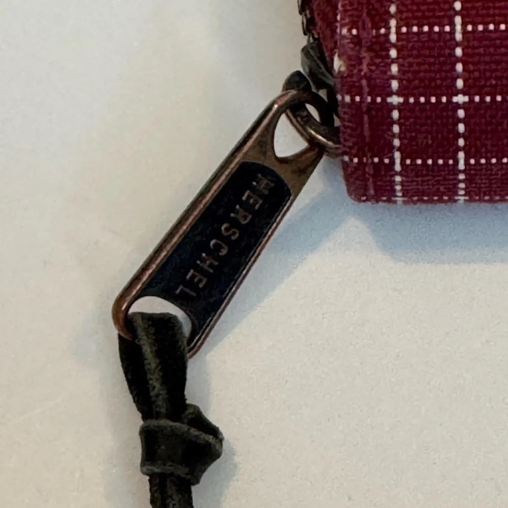 Herschel Supply Company  zip around maroon wallet
